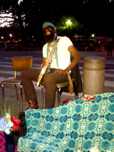 A cool street musician playing in front of the famous Cafe du Monde!