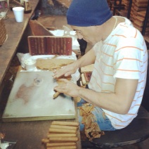A cigar maker at the "New Orleans Cigar factory"!